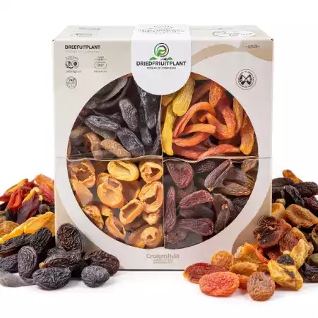 Elegant wedding favor gift box with decorative ribbon containing handpicked dried fruits for special celebration events